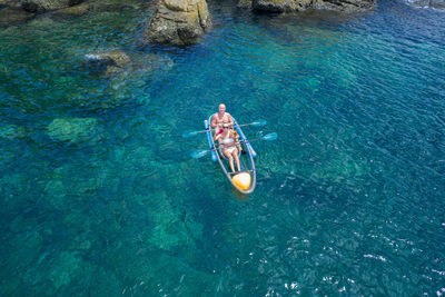 High angle view of man in boat in sea