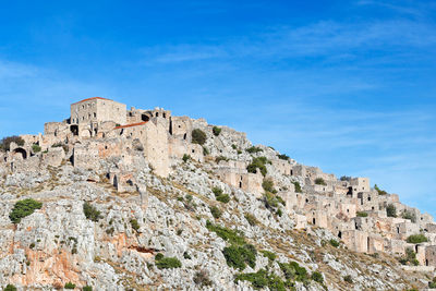 Low angle view of fort against sky