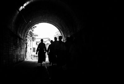 Samurai walking in tunnel