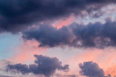 Low angle view of dramatic sky during sunset