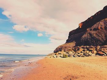 Scenic view of beach against sky