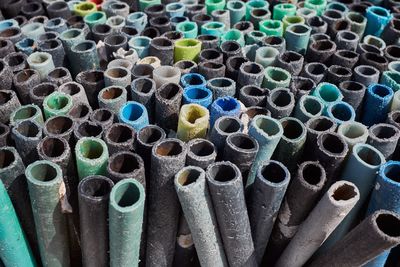 Full frame shot of plastic pipes in factory