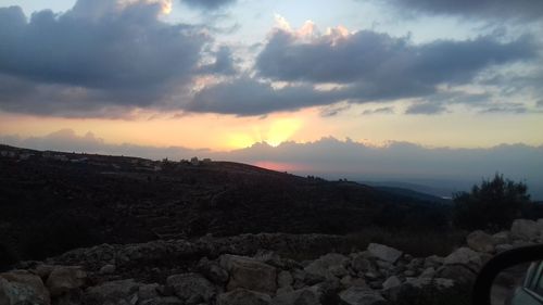 Scenic view of dramatic sky during sunset