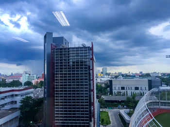 Modern buildings in city against sky