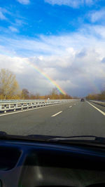 Road seen through car windshield