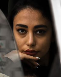 Close-up portrait of young woman