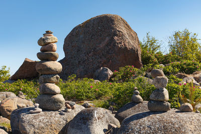 Stack of stones against clear sky