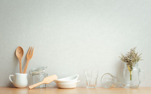 Vase on table against white background