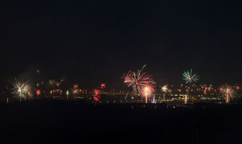 Firework display at night