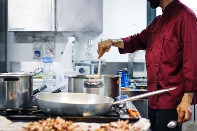 People working in kitchen