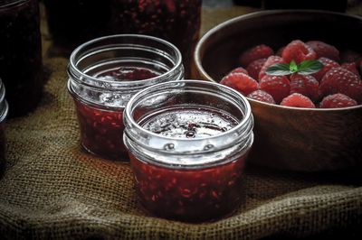 Close-up of fruits in jar on table