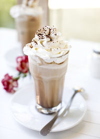 Close-up of drink served on table