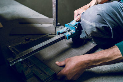 Midsection of man working at construction site