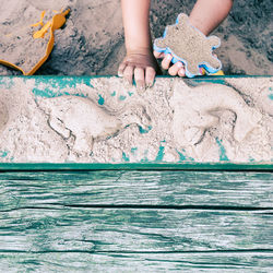 Child playing in sand