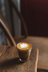 Close-up of coffee cup on table