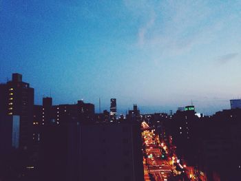 Illuminated cityscape at night