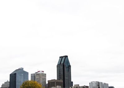 Modern cityscape against sky