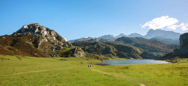 Scenic view of landscape and mountains against sky