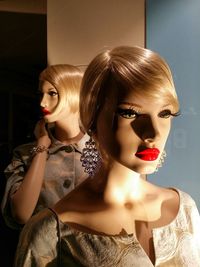 Close-up of mannequin wearing wig at retail display