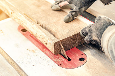 Cutting board with circular saw in carpentry workshop