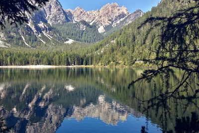 Scenic view of lake with mountains in background