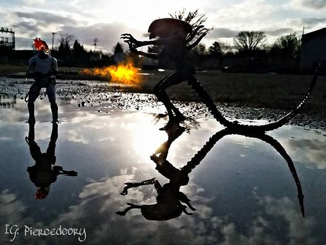 sky, water, lifestyles, cloud - sky, reflection, leisure activity, sunset, weather, full length, people, puddle, cloudy, cloud, standing, season, wet, outdoors, fun