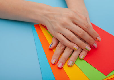 Close-up of hands on table