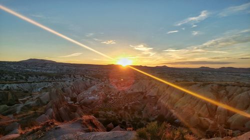 Sun shining over landscape