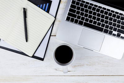 High angle view of coffee cup on table