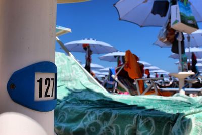 Close-up of boat against clear blue sky