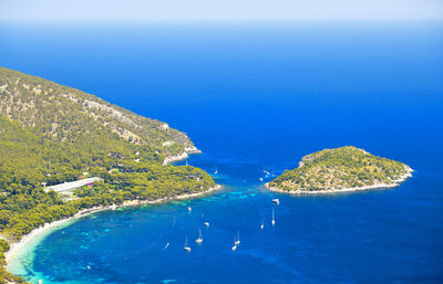 High angle view of sea shore against sky