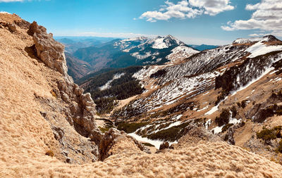 Panoramic view of rocky mountains against sky