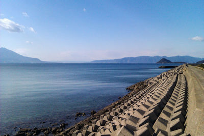 Scenic view of sea against blue sky