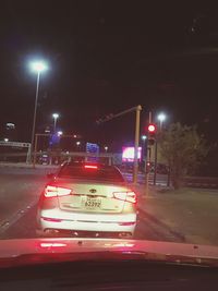 Cars on road at night