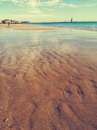 Scenic view of beach against sky