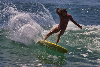 Man surfing in sea