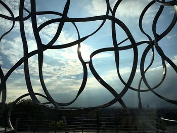 Metal structure against sky