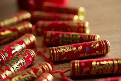 Chinese new year decoration,fire crackers on wooden background