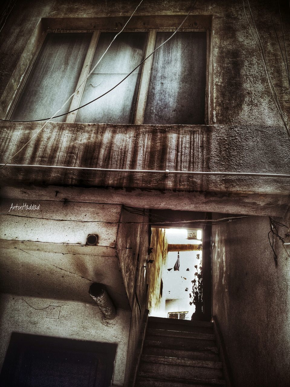 architecture, window, built structure, building exterior, abandoned, old, house, door, damaged, obsolete, run-down, weathered, building, deterioration, closed, bad condition, day, indoors, glass - material, wall - building feature