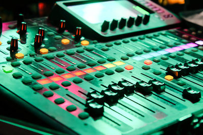 Closeup of an audio mixing control panel