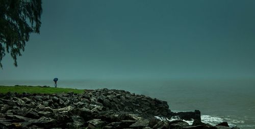 Scenic view of sea against clear sky