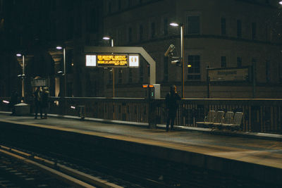 View of railroad tracks at night