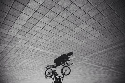 Upside down shot of person riding bicycle