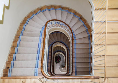 Directly below shot of spiral staircase of building