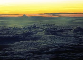 Scenic view of sea against dramatic sky