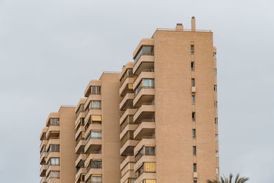Low angle view of modern building against sky