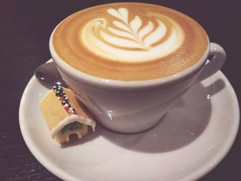 Close-up of cappuccino on table