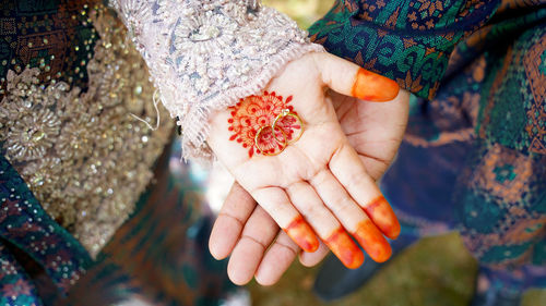 High angle view of woman holding hands