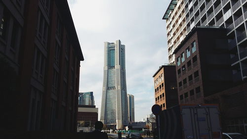 Low angle view of skyscrapers against sky