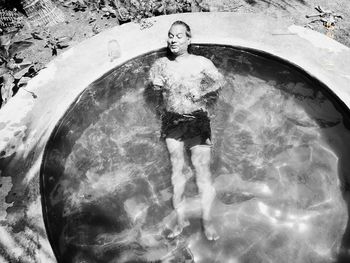 High angle view of woman in swimming pool